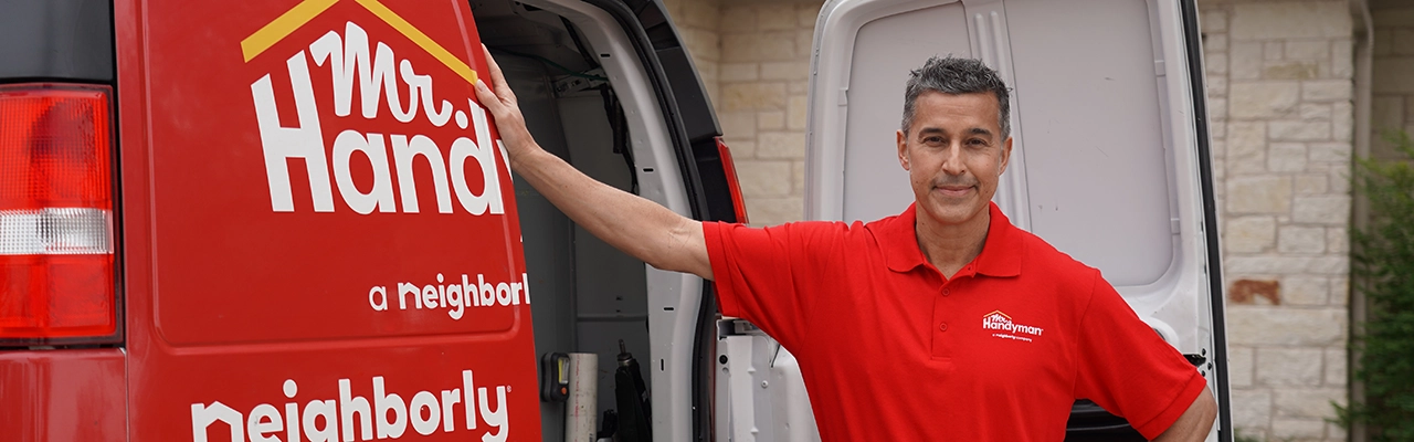 mrh_van_rear_door_desktop_1280x400_rs Service professional at the back of a service van.